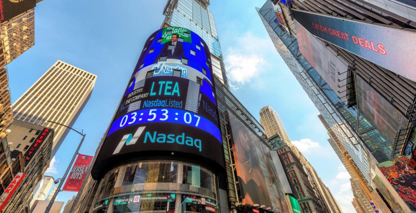 What role did the late-week chip stock rally play in the Nasdaq’s performance?